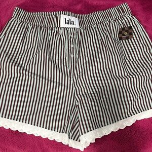 Dressed in LALA Striped Boxer-Style Shorts in Black and White